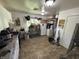 Practical kitchen with white cabinets, neutral flooring, and ample space for appliances and storage at 2015 Rosewood Dr, Anderson, IN 46011