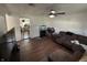 Inviting living room with hardwood floors and a modern ceiling fan with plenty of space at 2015 Rosewood Dr, Anderson, IN 46011