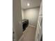 Functional laundry room with a washer and dryer set against a neutral backdrop at 2263 S Carlota Dr, New Palestine, IN 46163