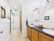 Bright bathroom with double sink vanity, white walls, and stylish fixtures at 2353 E 10Th St, Anderson, IN 46012