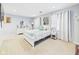 Spacious main bedroom offering ample natural light, neutral colors, and comfortable carpeting at 2353 E 10Th St, Anderson, IN 46012