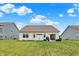 Well-maintained backyard with patio, grill and plenty of space for outdoor activities at 247 Verdant Dr, Cicero, IN 46034