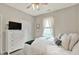 Inviting bedroom featuring white decor, large window, and ample closet space at 247 Verdant Dr, Cicero, IN 46034
