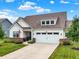 Beautiful single-Gathering home with an attached two-car garage and a well-kept lawn at 247 Verdant Dr, Cicero, IN 46034