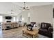 Inviting living room featuring a comfortable leather couch and stylish decor at 247 Verdant Dr, Cicero, IN 46034