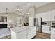 Open floor plan with a large kitchen, island and view into the living room at 247 Verdant Dr, Cicero, IN 46034