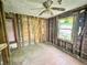 Bedroom exhibiting unfinished framing and natural light; a renovation opportunity with vintage character at 2606 Raible Ave, Anderson, IN 46011