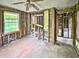Bedroom featuring exposed framing and natural light, awaiting transformation into a cozy retreat at 2606 Raible Ave, Anderson, IN 46011