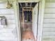 Interior view from the front door, showcasing a dilapidated interior at 2606 Raible Ave, Anderson, IN 46011
