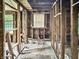 Interior view of a home with unfinished framing, offering a unique opportunity for a personalized renovation project at 2606 Raible Ave, Anderson, IN 46011
