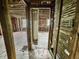 Interior view showcases original framing and layout, an exciting project for a renovation enthusiast at 2606 Raible Ave, Anderson, IN 46011