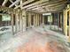 Interior view showcasing the exposed structure and framing, awaiting renovation at 2606 Raible Ave, Anderson, IN 46011