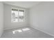 Bright bedroom with carpet, window, and neutral paint at 2693 Penn Ave, Plainfield, IN 46168