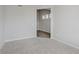 Carpeted bedroom with neutral walls, a large doorway, and natural light at 2693 Penn Ave, Plainfield, IN 46168