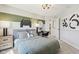 Teen bedroom with a jeep accent wall and a desk at 2693 Penn Ave, Plainfield, IN 46168