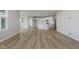 Open concept living space with kitchen, living, and dining areas at 2693 Penn Ave, Plainfield, IN 46168