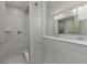 Modern shower with gray tile and glass partition at 2693 Penn Ave, Plainfield, IN 46168