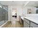 Bright bathroom boasting dual vanities, modern fixtures, and a separate shower at 2705 Penn Ave, Plainfield, IN 46168