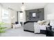 Well-lit bedroom featuring neutral tones, comfortable furnishings, and bright décor at 2705 Penn Ave, Plainfield, IN 46168