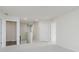 Upstairs hallway with multiple doorways and neutral carpet at 2705 Penn Ave, Plainfield, IN 46168