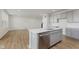 Stylish kitchen island includes a sink, dishwasher, and sleek gray cabinets at 2705 Penn Ave, Plainfield, IN 46168