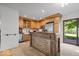 Well-lit kitchen with stainless steel appliances, ample counter space, and an island at 305 N 1100 E, Zionsville, IN 46077