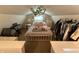 Cozy bedroom with vaulted ceilings, carpeting, floral decorations, and space for storage at 309 Arlington Dr, Whiteland, IN 46184