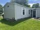 Exterior of home with a screen door entrance into the home from the backyard at 3161 Compass Dr, Franklin, IN 46131