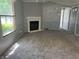 Living room featuring a cozy fireplace and natural light at 3161 Compass Dr, Franklin, IN 46131