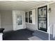 Covered porch with linoleum flooring and two points of entry into the home at 3161 Compass Dr, Franklin, IN 46131