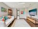 Cozy room featuring hardwood floors, a white sofa and an area rug at 3316 Shelborne Woods Pkwy, Carmel, IN 46032