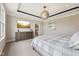 Serene main bedroom featuring a stylish dresser, a large TV, and a cozy bed offers a relaxing retreat at 3316 Shelborne Woods Pkwy, Carmel, IN 46032