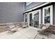 Covered patio featuring comfortable seating, providing a relaxing outdoor space at 3316 Shelborne Woods Pkwy, Carmel, IN 46032