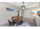 Spacious playroom with a round table, toy storage, and whiteboards, offering a versatile space at 3316 Shelborne Woods Pkwy, Carmel, IN 46032