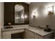 Bathroom with granite countertops and large mirror at 410 Somerset W Dr, Indianapolis, IN 46260