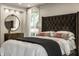 Cozy main bedroom showcasing a luxurious bed and elegant decor at 410 Somerset W Dr, Indianapolis, IN 46260