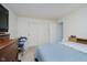 Bedroom with a bed, dresser, closet, and carpet at 4232 Linden Ln, Anderson, IN 46011