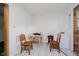 Functional dining area with round table and a mini refrigerator, ideal for casual dining at 4232 Linden Ln, Anderson, IN 46011