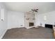 Spacious living room with brick fireplace and ceiling fan at 4232 Linden Ln, Anderson, IN 46011