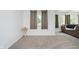 Bright room with carpet, curtains, and a small table at 4232 Linden Ln, Anderson, IN 46011