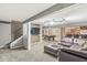 Finished basement with a bar, pool table, and a large leather sectional at 4818 Arabian Run, Indianapolis, IN 46228