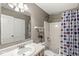 Bathroom featuring a shower and tub combo and vanity with white sink at 4818 Arabian Run, Indianapolis, IN 46228