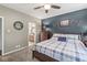 Serene bedroom with a king bed, decorative wall art, an ensuite bathroom and a calming color scheme at 4818 Arabian Run, Indianapolis, IN 46228