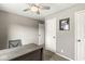 Bedroom featuring a desk and two closets, with neutral colors and carpet at 4818 Arabian Run, Indianapolis, IN 46228