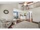 An open concept living space offering a modern design with hardwood floors and plenty of natural light at 4818 Arabian Run, Indianapolis, IN 46228