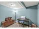 Inviting music room with a piano, vintage record player, and cozy lighting for a creative space at 4818 Arabian Run, Indianapolis, IN 46228