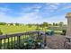 Backyard patio featuring outdoor seating and a view of the green common area at 5560 Goodwin St, Indianapolis, IN 46234