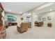 Finished basement with a carpet, seating area, TV, and decorative elements at 5560 Goodwin St, Indianapolis, IN 46234
