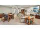 Finished basement area showcasing a table, couch, TV, and access to other rooms at 5560 Goodwin St, Indianapolis, IN 46234