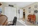 Cozy home office with natural light and plenty of storage space and neutral carpet at 5560 Goodwin St, Indianapolis, IN 46234